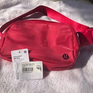 Lululemon Everywhere Belt Bag in Red/Watermelon color. NWT, never used.